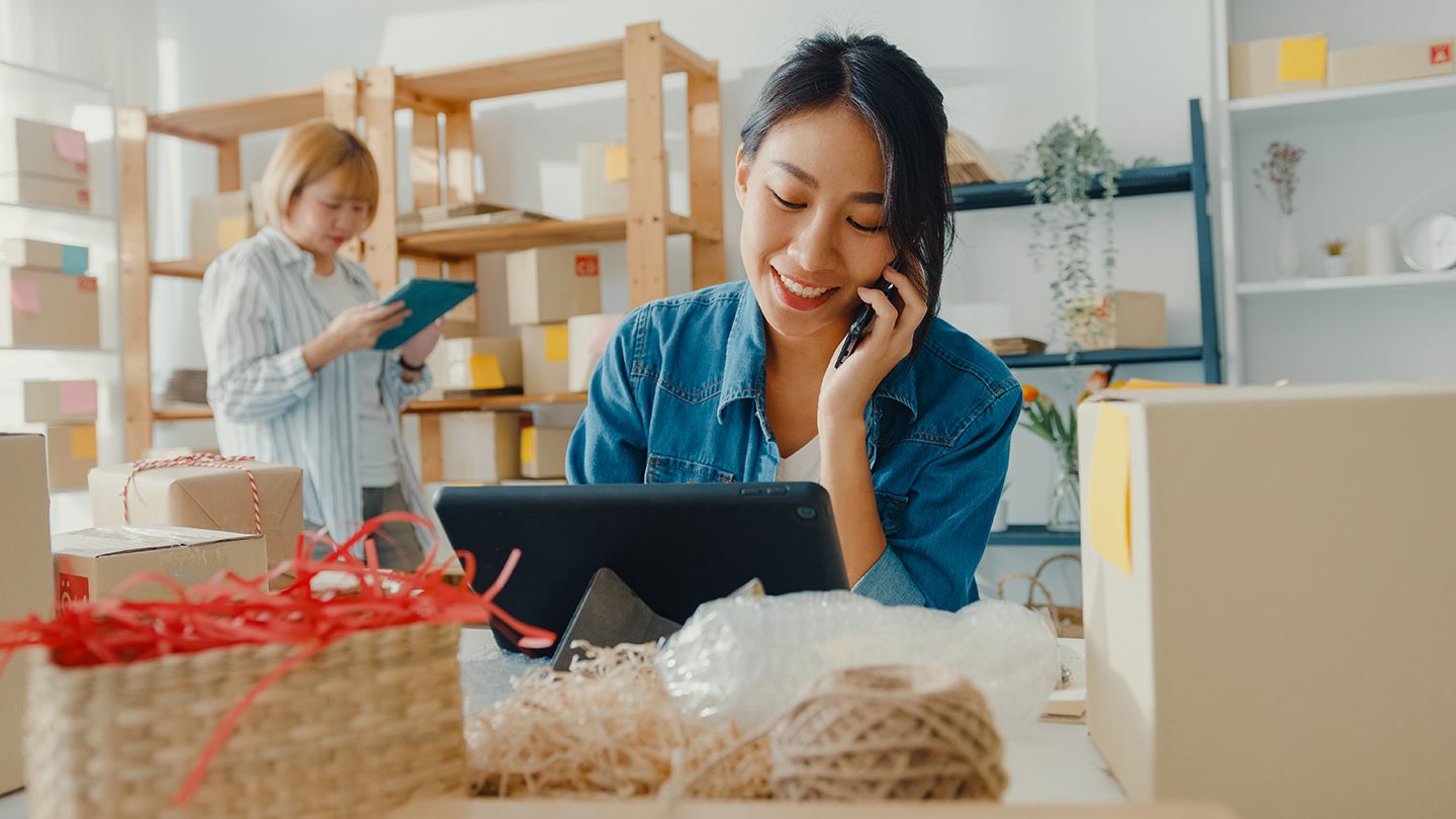 Small business owner using a tablet computer.