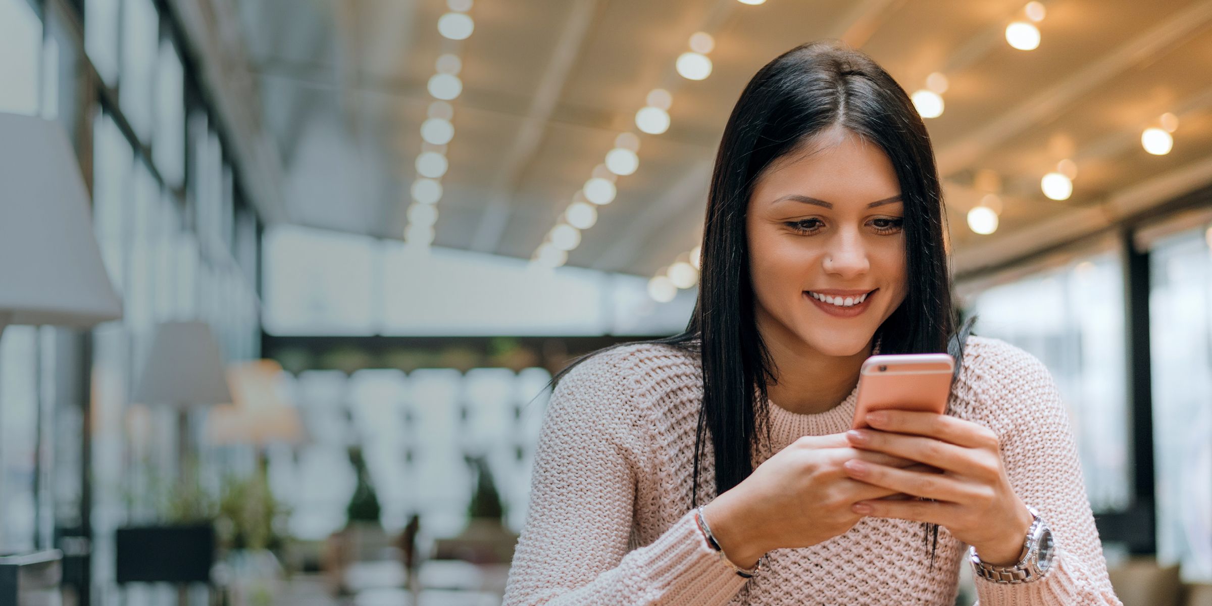 woman paying with phone 