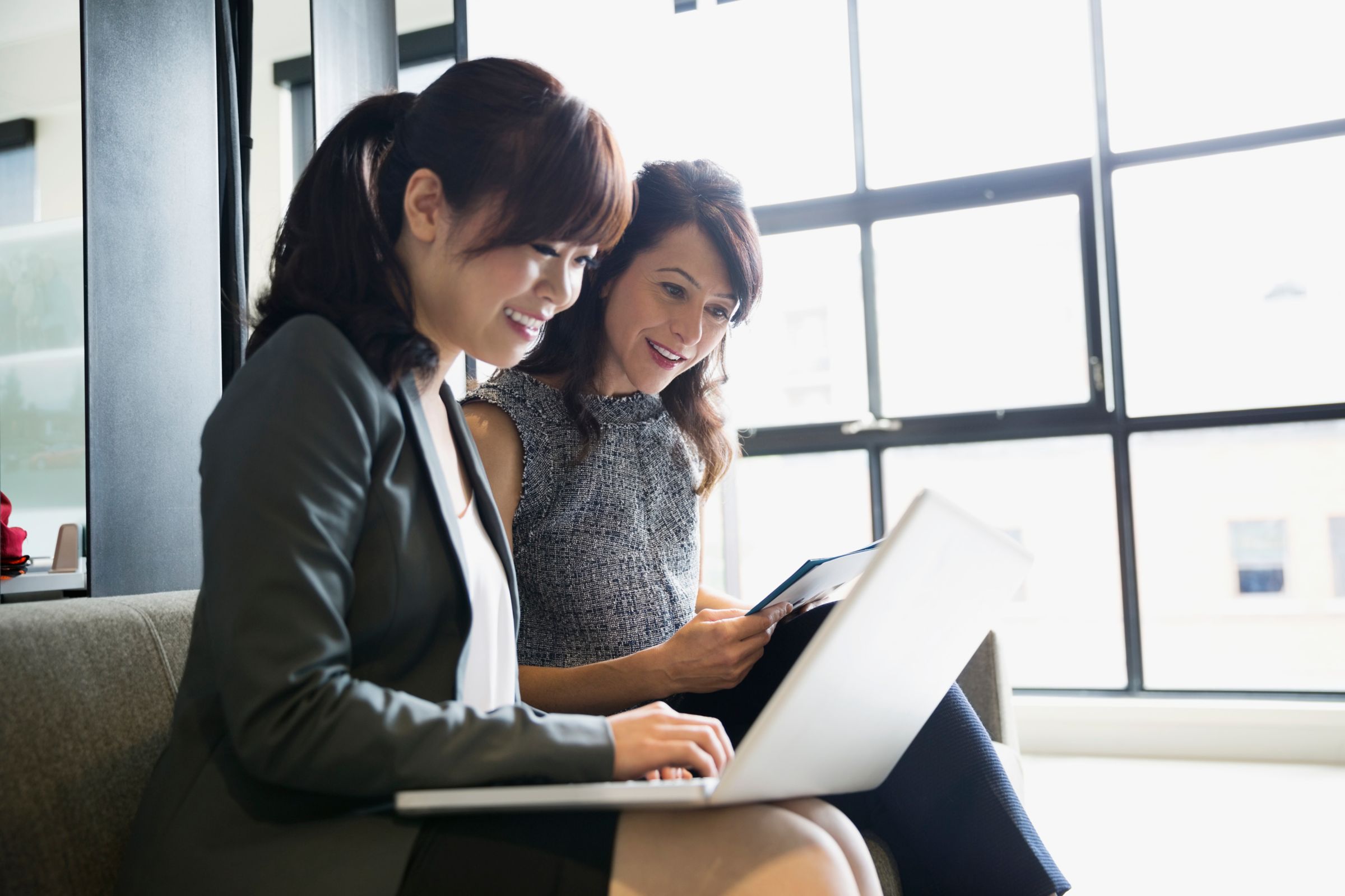 women looking at a computer