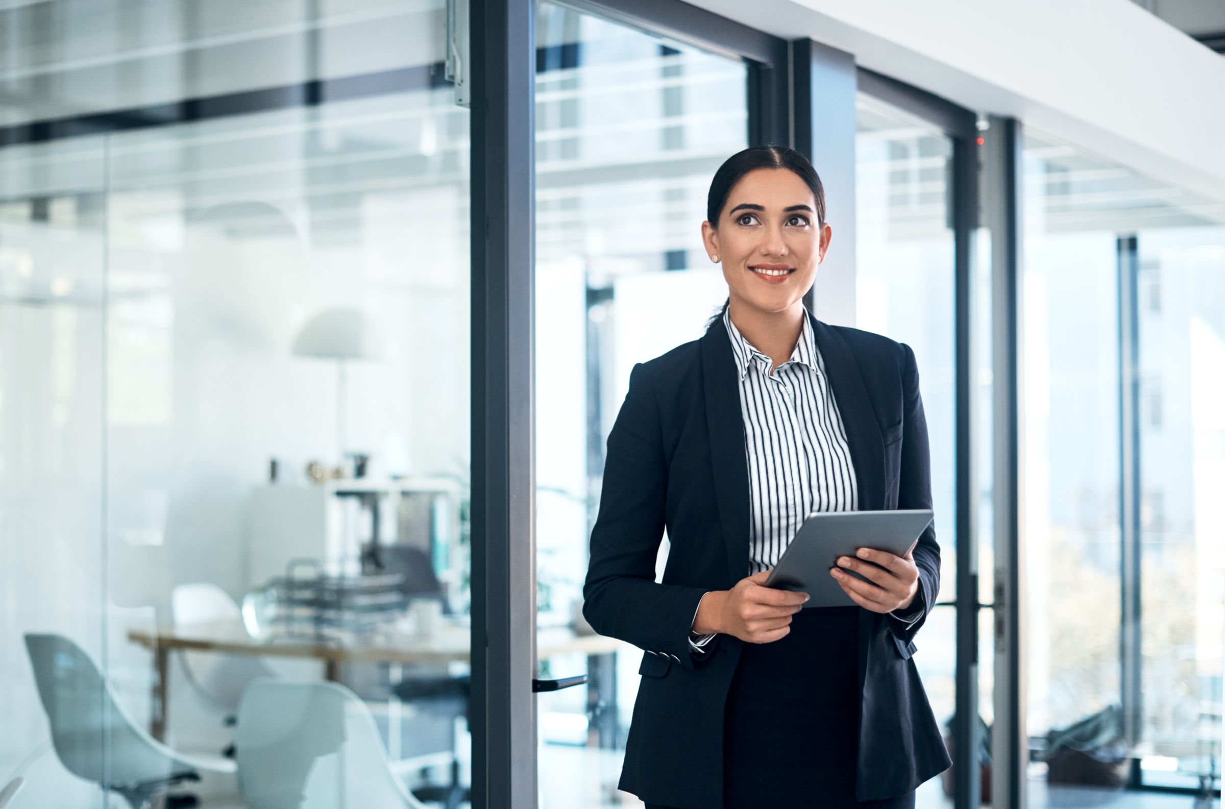 a woman holding a tablet