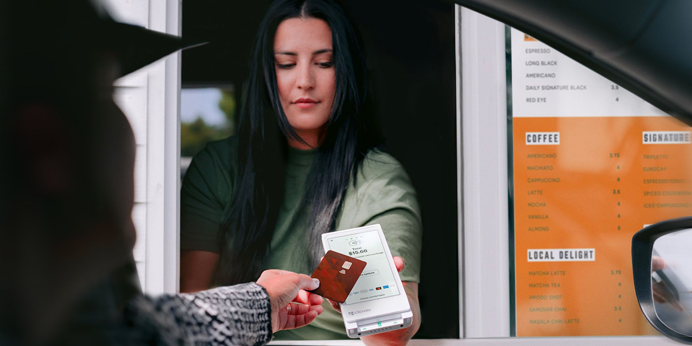 woman accepting payment with Clover flex pocket