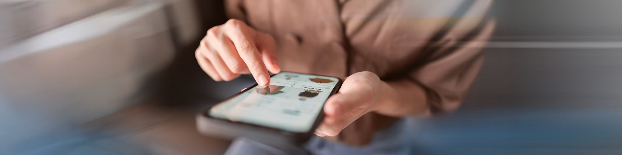 lady using smartphone to explore online shop