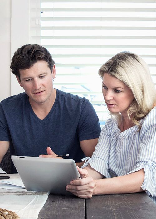couple working on their tablet