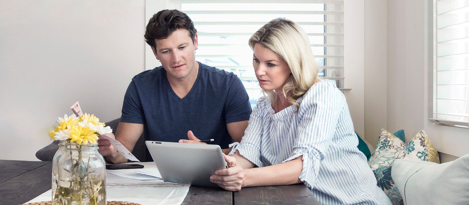 couple working on their tablet