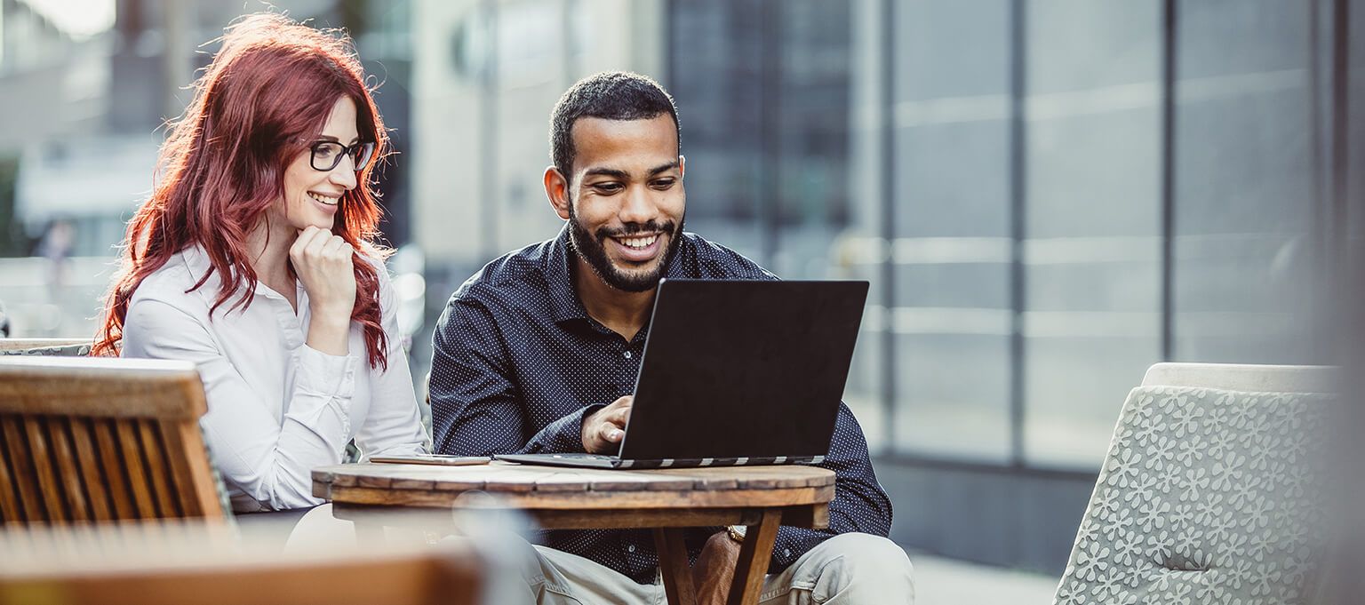 two business people discussion use laptop