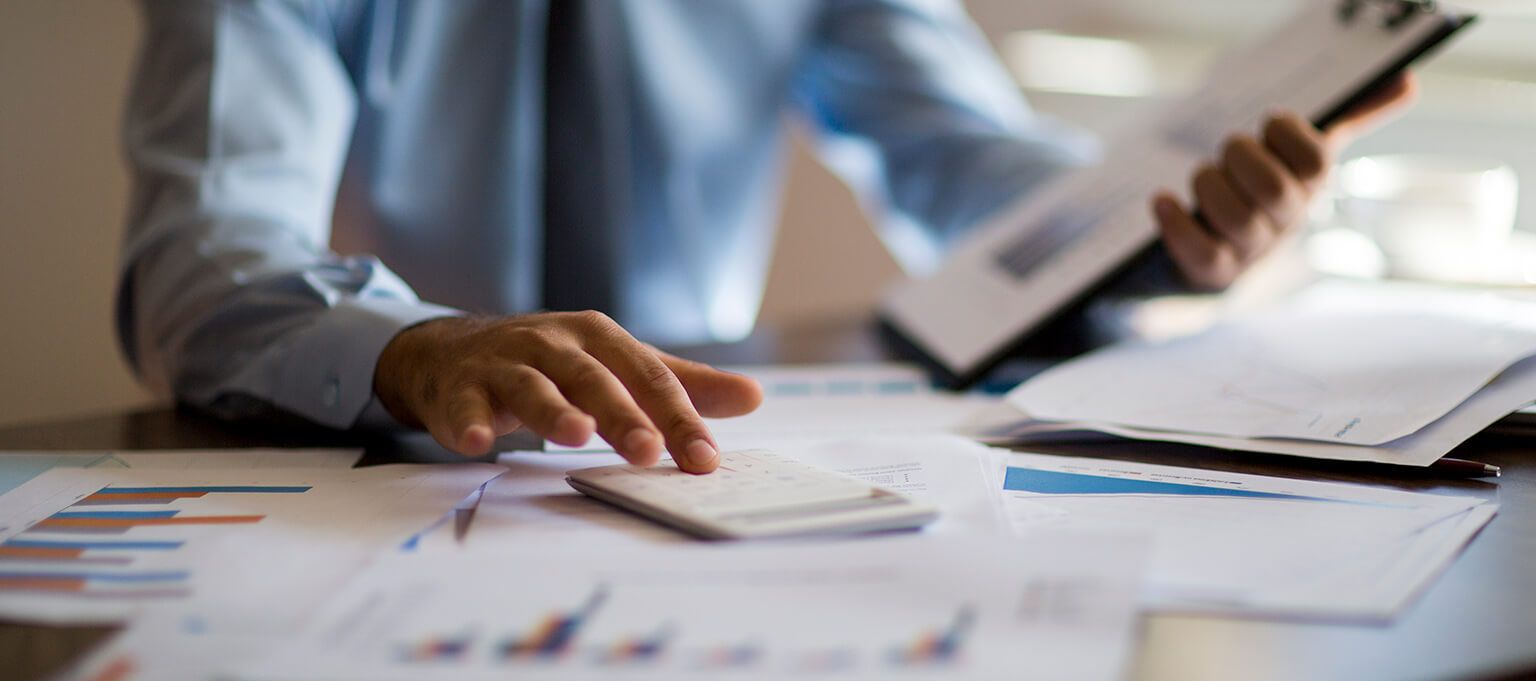 Man working with financial reports