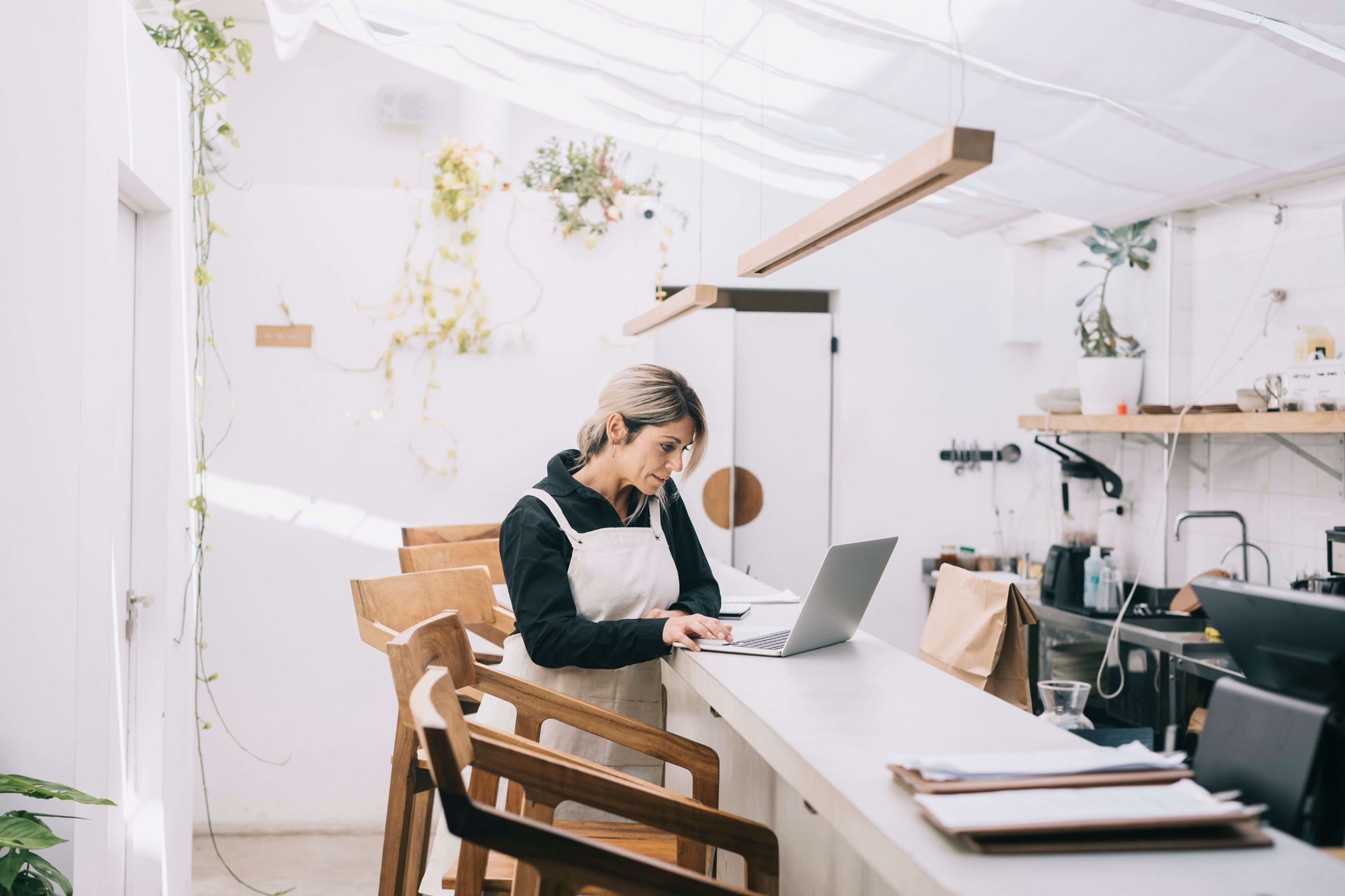 two small business owners talking together