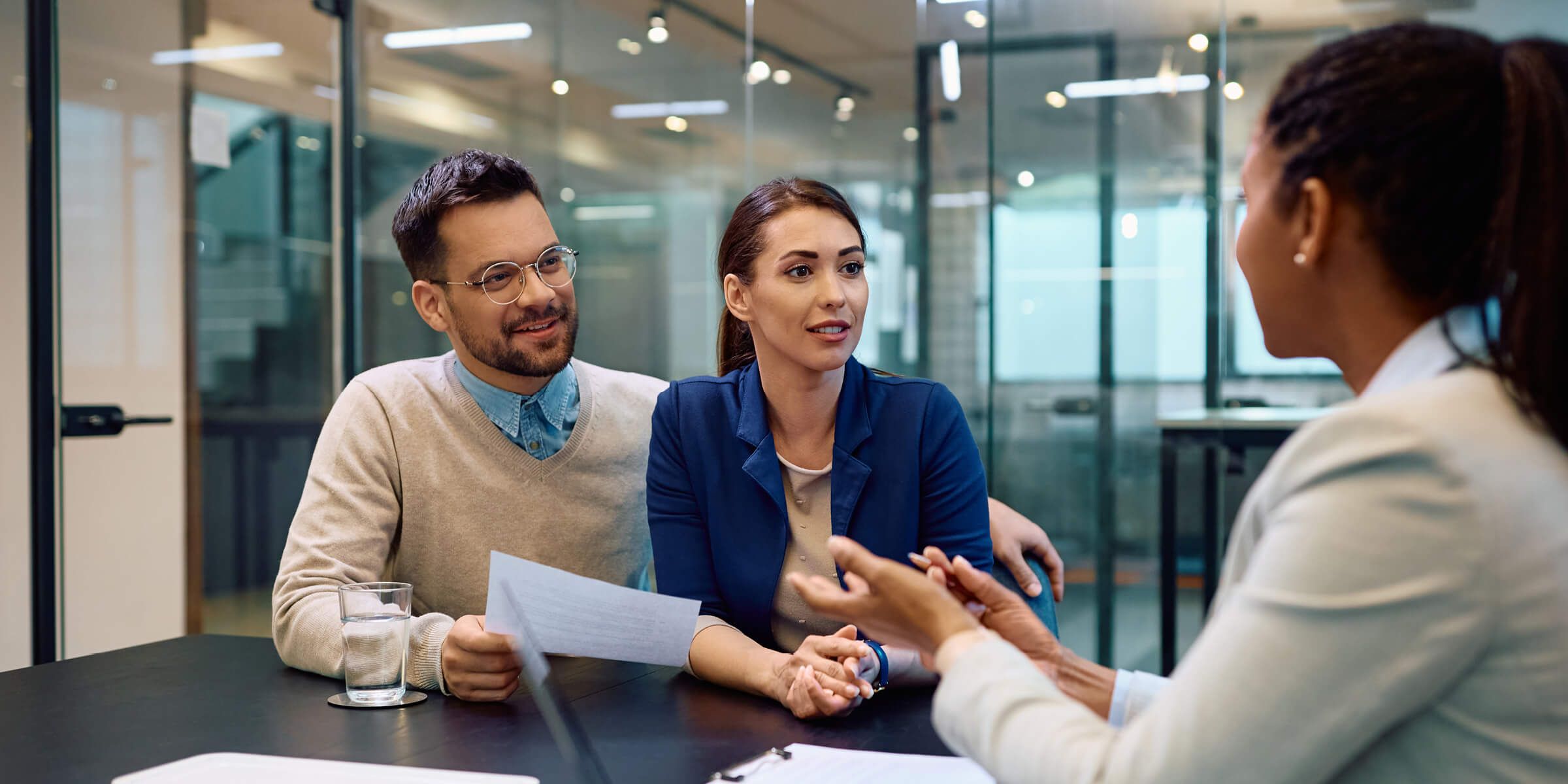 couple talking to bank representative