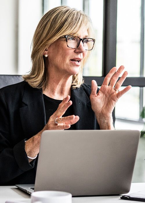 executive women leading a meeting