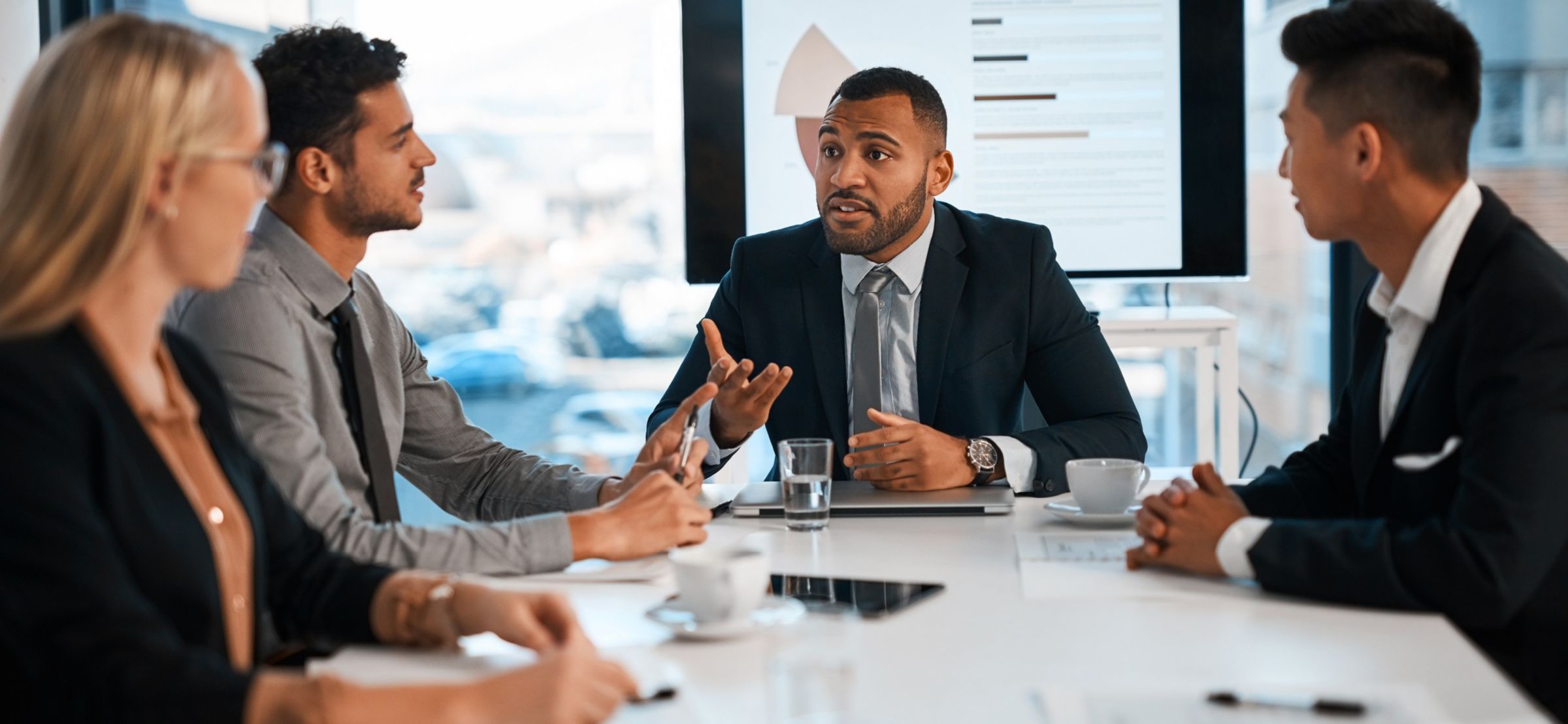 Group of business people sitting together