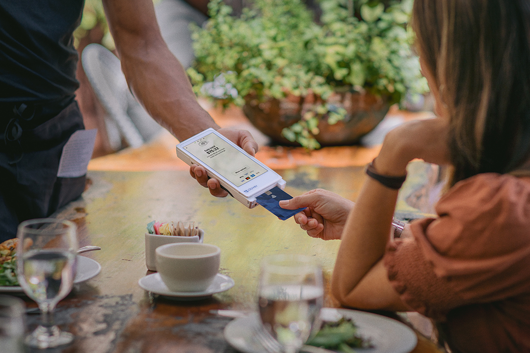 Close-up of a phone completing a contactless payment