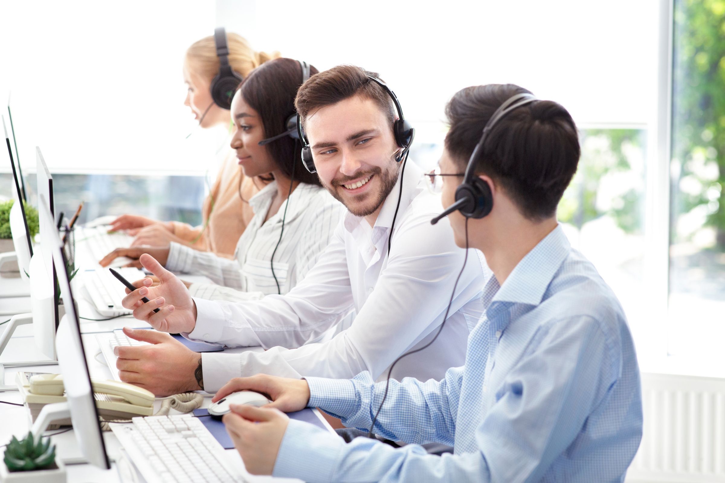 a group of people wearing headsets