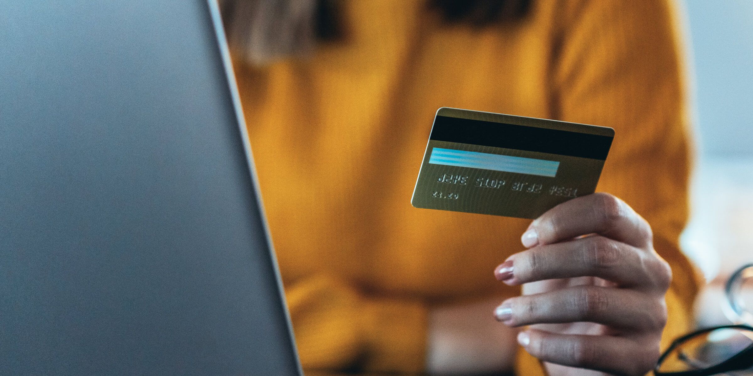Woman holding credit card