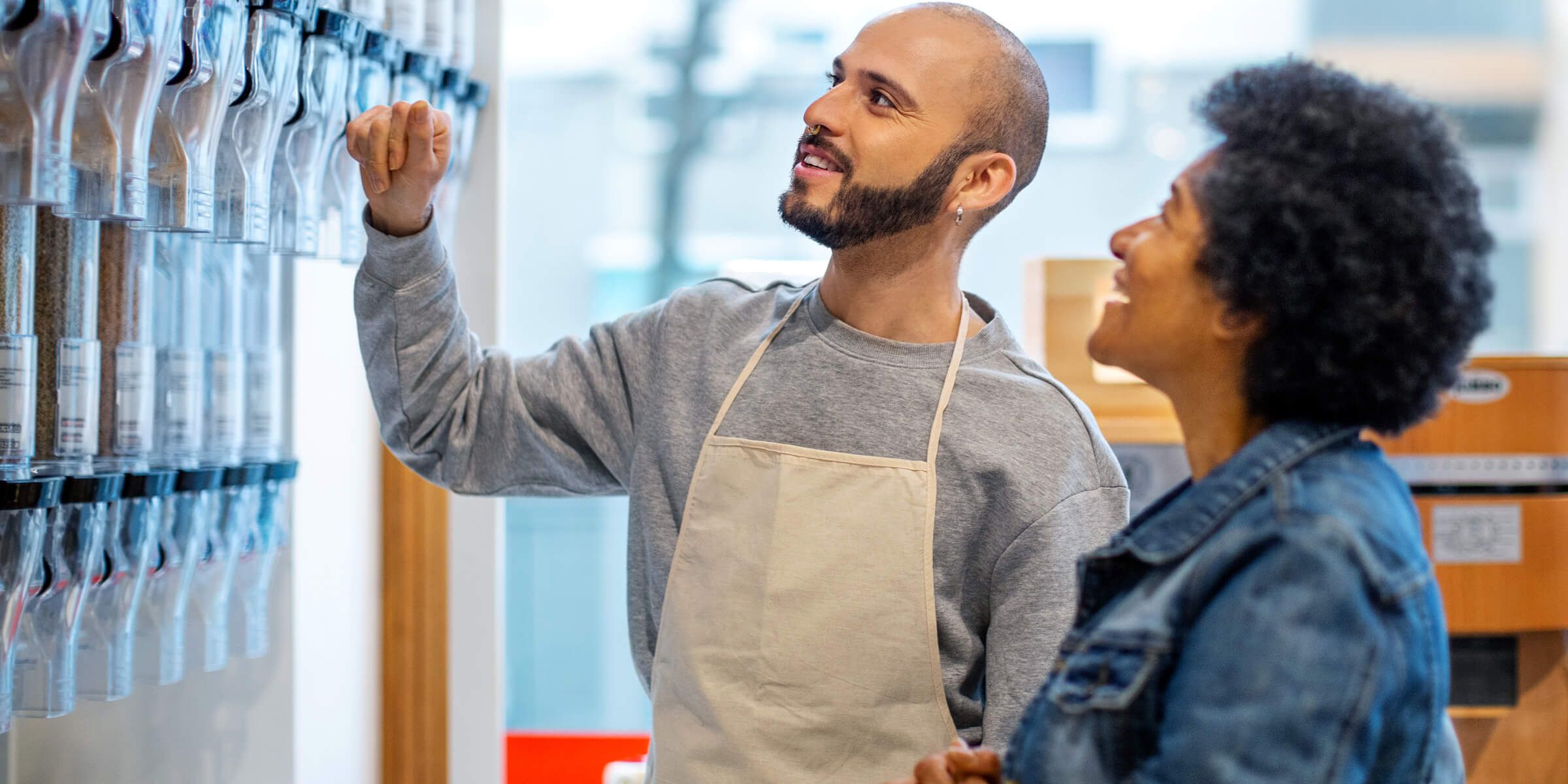 Merchant assisting a customer.