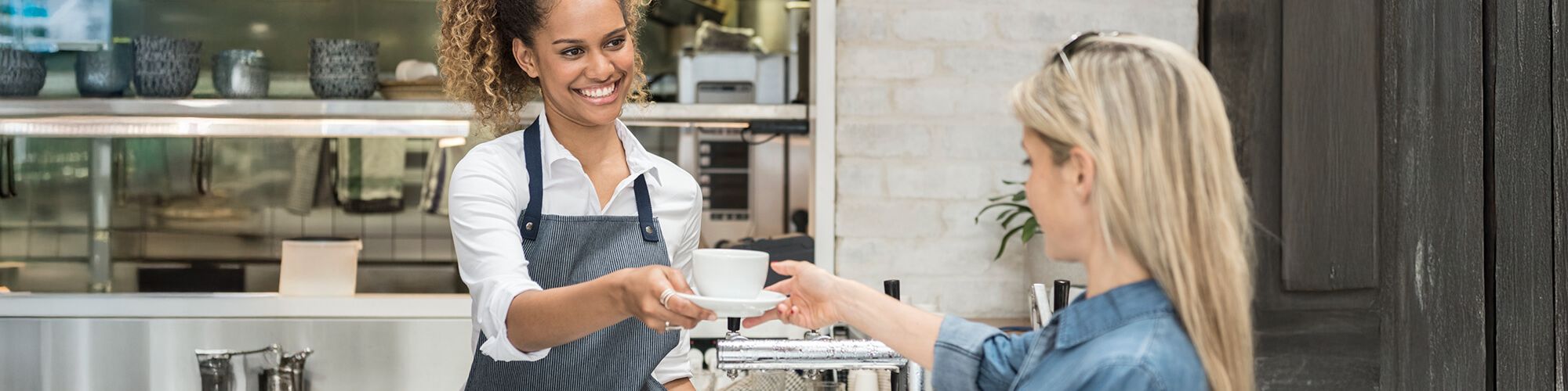 Woman picking up takeout in her car