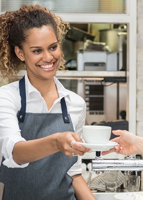 Woman picking up takeout in her car