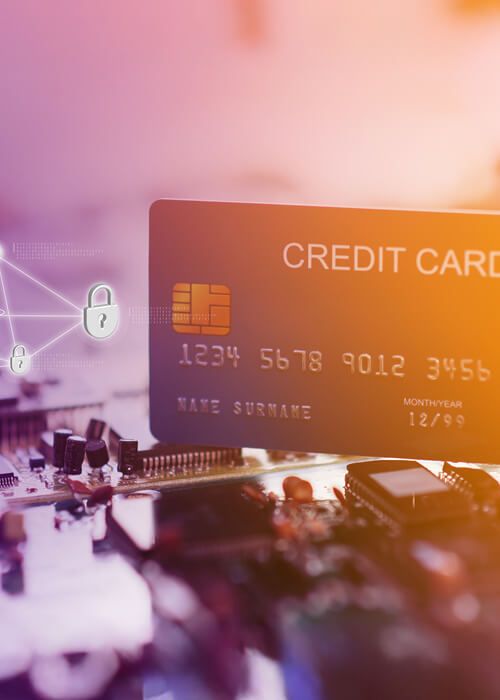 abstract of credit card sitting on motherboard with digital image of lock