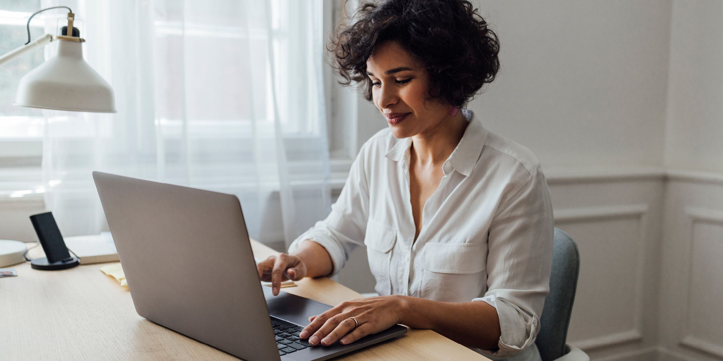 Woman working on her laptop computer