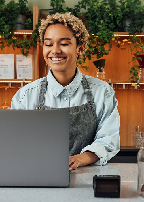 Girl looking at phone smiling