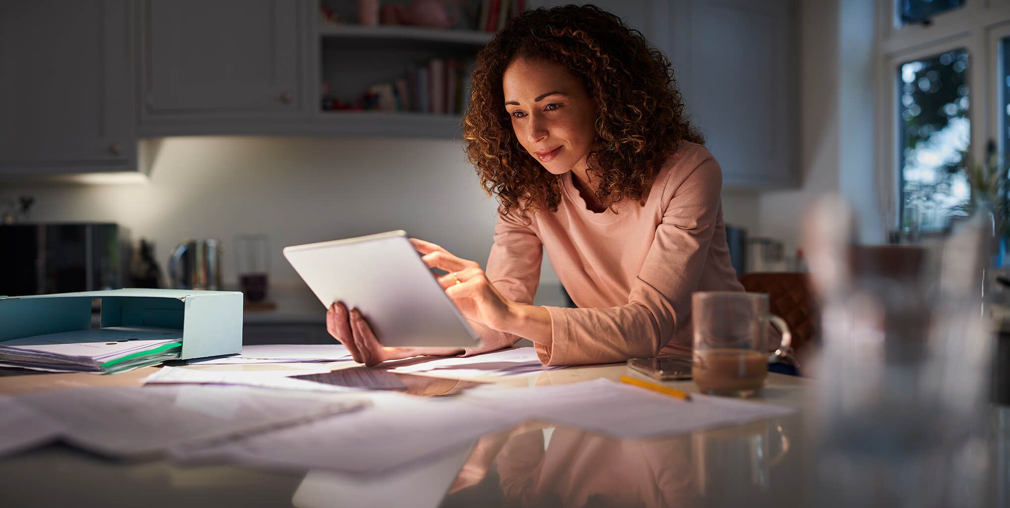 woman looking at paper