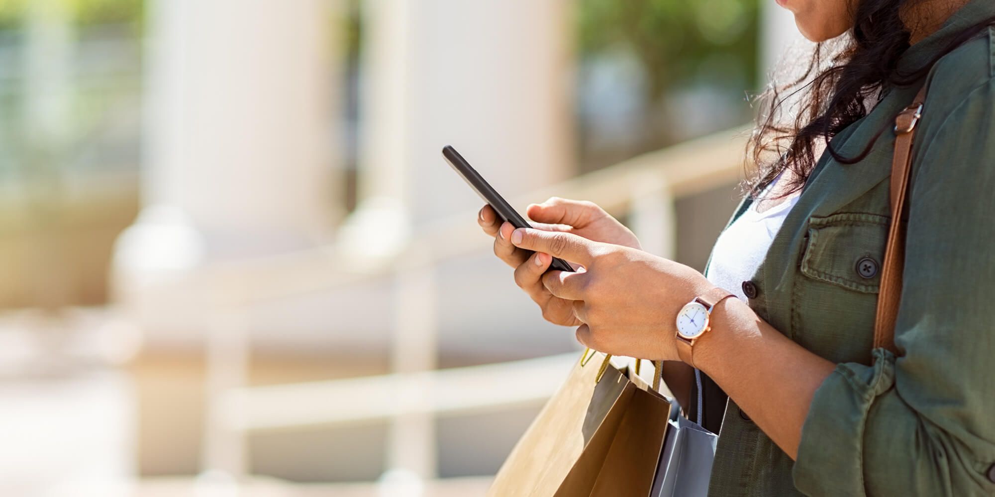 Woman's hands holding phone
