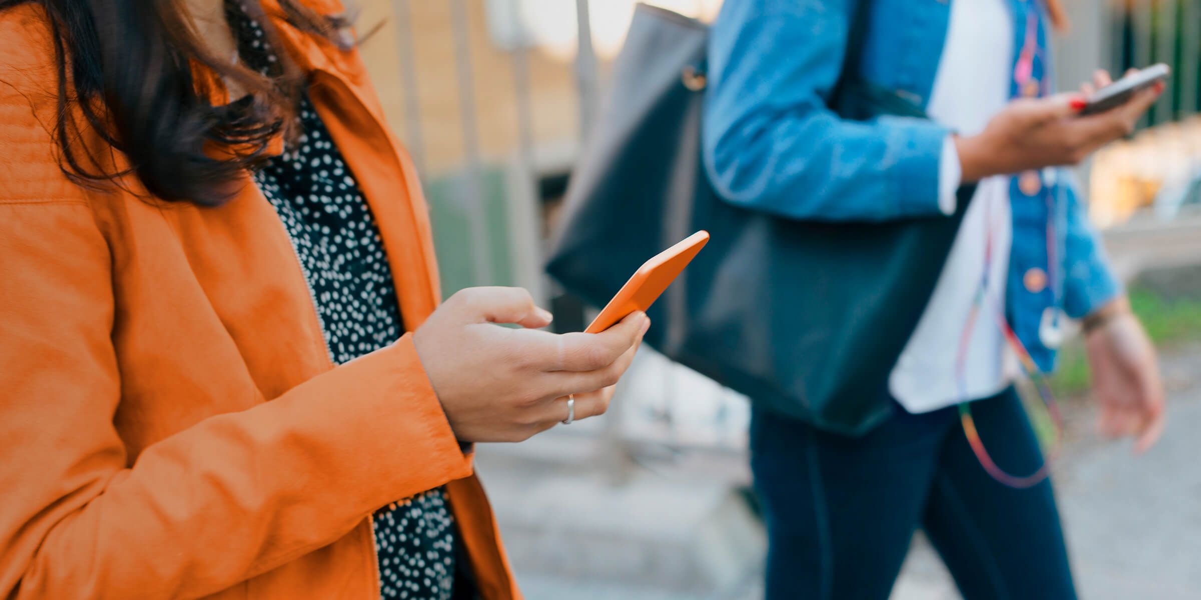 Girl looking at phone smiling