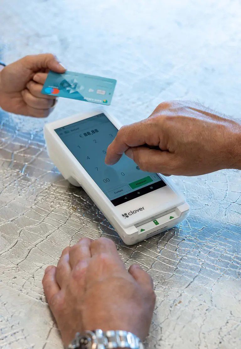 clover payment device accepting a credit card payment